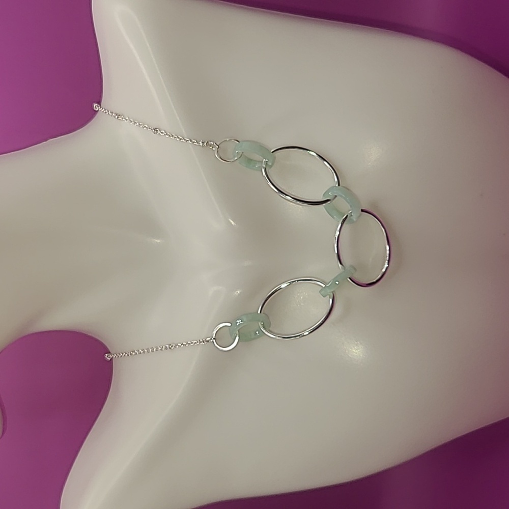 Silver toned and light green circle chain necklace